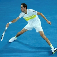 Daniil Medvedev hits a return against Stefanos Tsitsipas during their Australian Open semifinal at Melbourne Park on Friday.  | AFP-JIJI