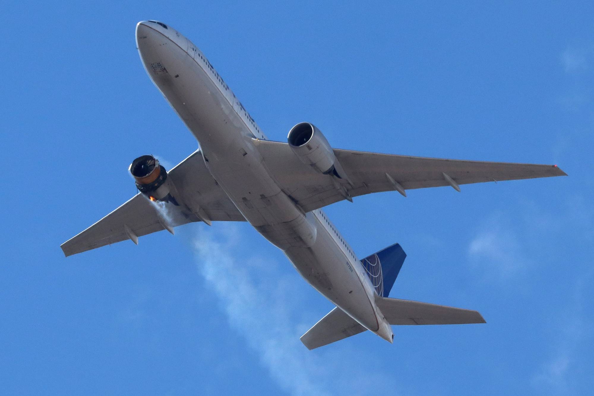 United Airlines plane showers debris near Denver after engine failure - The Japan Times