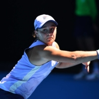 Ash Barty hits a return against Karolina Muchova during the Australian Open quarterfinals in Melbourne on Feb 17. | AFP-JIJI