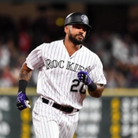 The Rockies\' Ian Desmond rounds the bases after a home run against the Cardinals at Coors Field in Denver on Sept. 11, 2019. | USA TODAY / VIA REUTERS