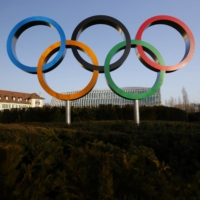 The Olympic rings are pictured in front of the International Olympic Committee headquarters in Lausanne, Switzerland, on Wednesday. | REUTERS