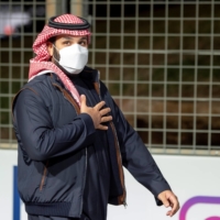 Saudi Crown Prince Mohammed bin Salman arrives at the Diriyah E-Prix 2021 in Riyadh on Saturday.  | BANDAR ALGALOUD / SAUDI ROYAL COURT / VIA REUTERS