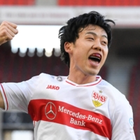 Stuttgart\'s Wataru Endo celebrates after scoring the team\'s second goal against Schalke on Saturday in Stuttgart, Germany. | POOL / VIA REUTERS