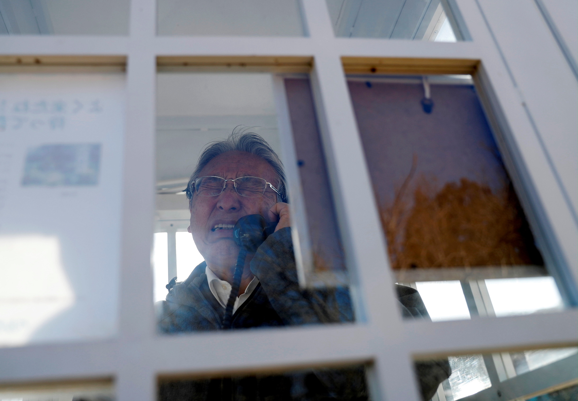 Kazuyoshi Sasaki calls his late wife, Miwako, whom he lost in March 11, 2011 triple disaster. | REUTERS