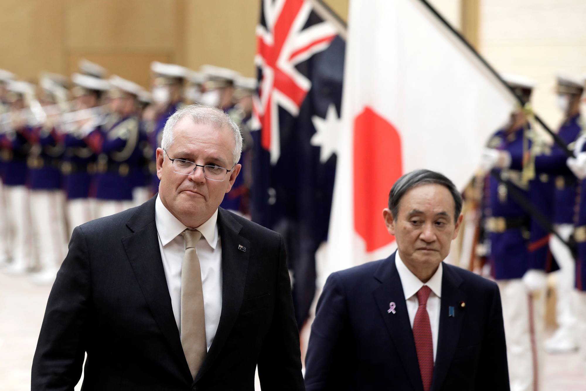 Australian Prime Minister Scott Morrison met with Prime Minister Yoshihide Suga in person last Nov. 17 during his first overseas trip to Tokyo following the start of the COVID-19 pandemic. | POOL / VIA REUTERS