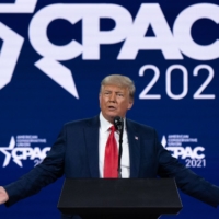 Former U.S. President Donald Trump speaks during the Conservative Political Action Conference (CPAC) in Orlando, Florida, on Sunday. | BLOOMBERG