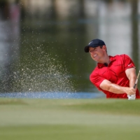 Rory McIlroy plays a shot from a bunker on the second hole during the final round of the Workday Championship on Sunday in Bradenton, Florida. | USA TODAY / VIA REUTERS
