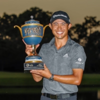 Colin Morikawa poses with the trophy after winning the Workday Championship on Sunday in Bradenton, Florida. | USA TODAY / VIA REUTERS