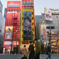 Tokyo’s Akihabara district, a center of anime culture, on Jan. 14. The industry’s boom has only widened the gap between profits and wages.  | NORIKO HAYASHI/THE NEW YORK TIMES 