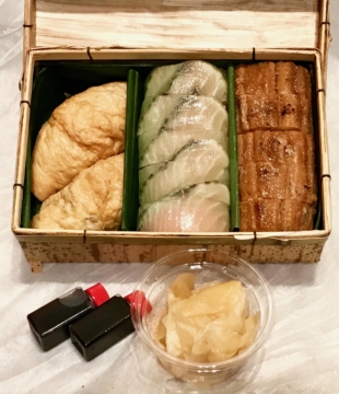 Tempting take-out: Tenoshima sushi sets win pride of place on this restaurant's to-go menu. | ROBBIE SWINNERTON