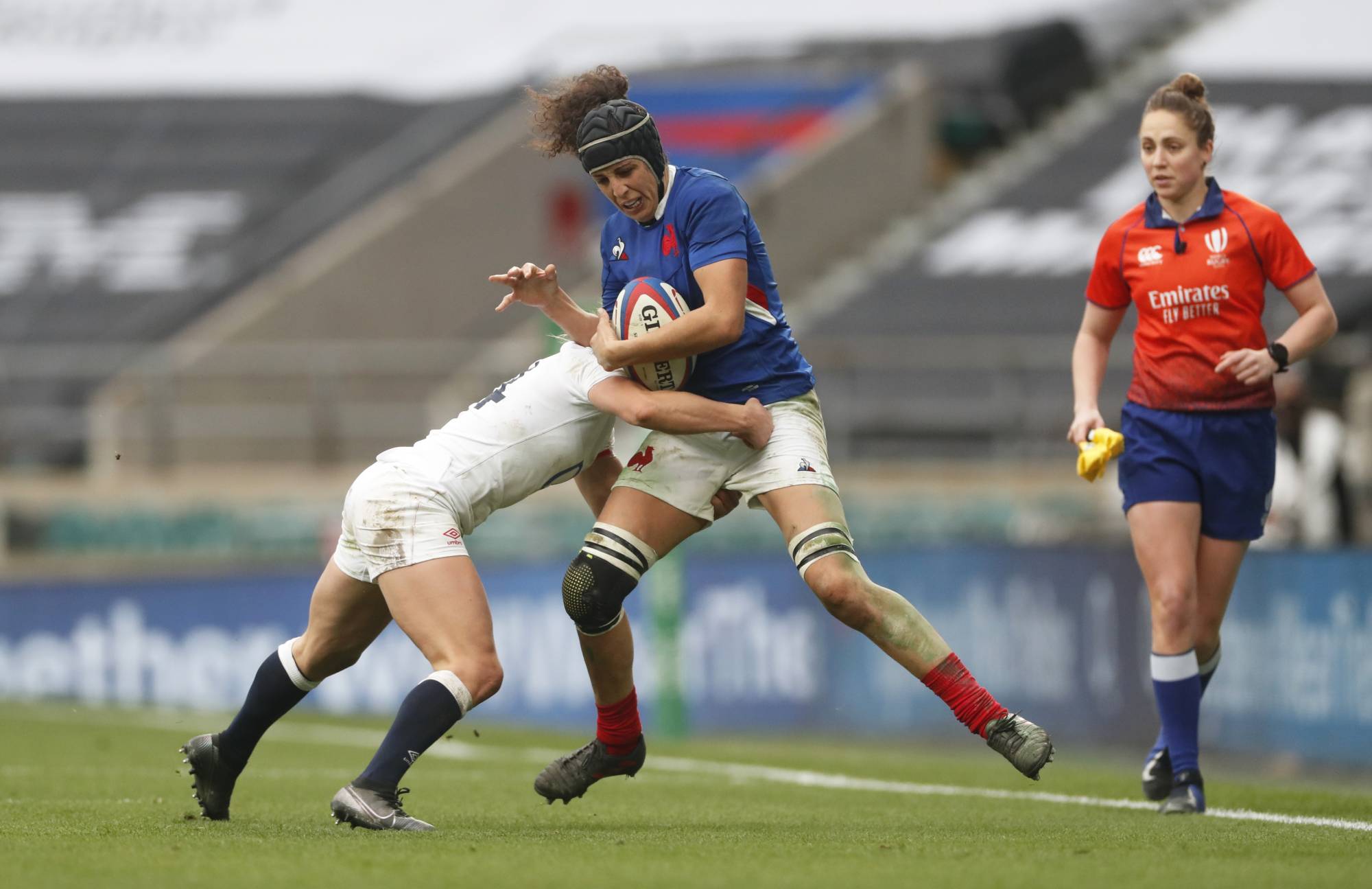 France’s Cyrielle Banet is tackled by England’s Abbie Ward during a match in London on Nov. 21, 2020. | REUTERS