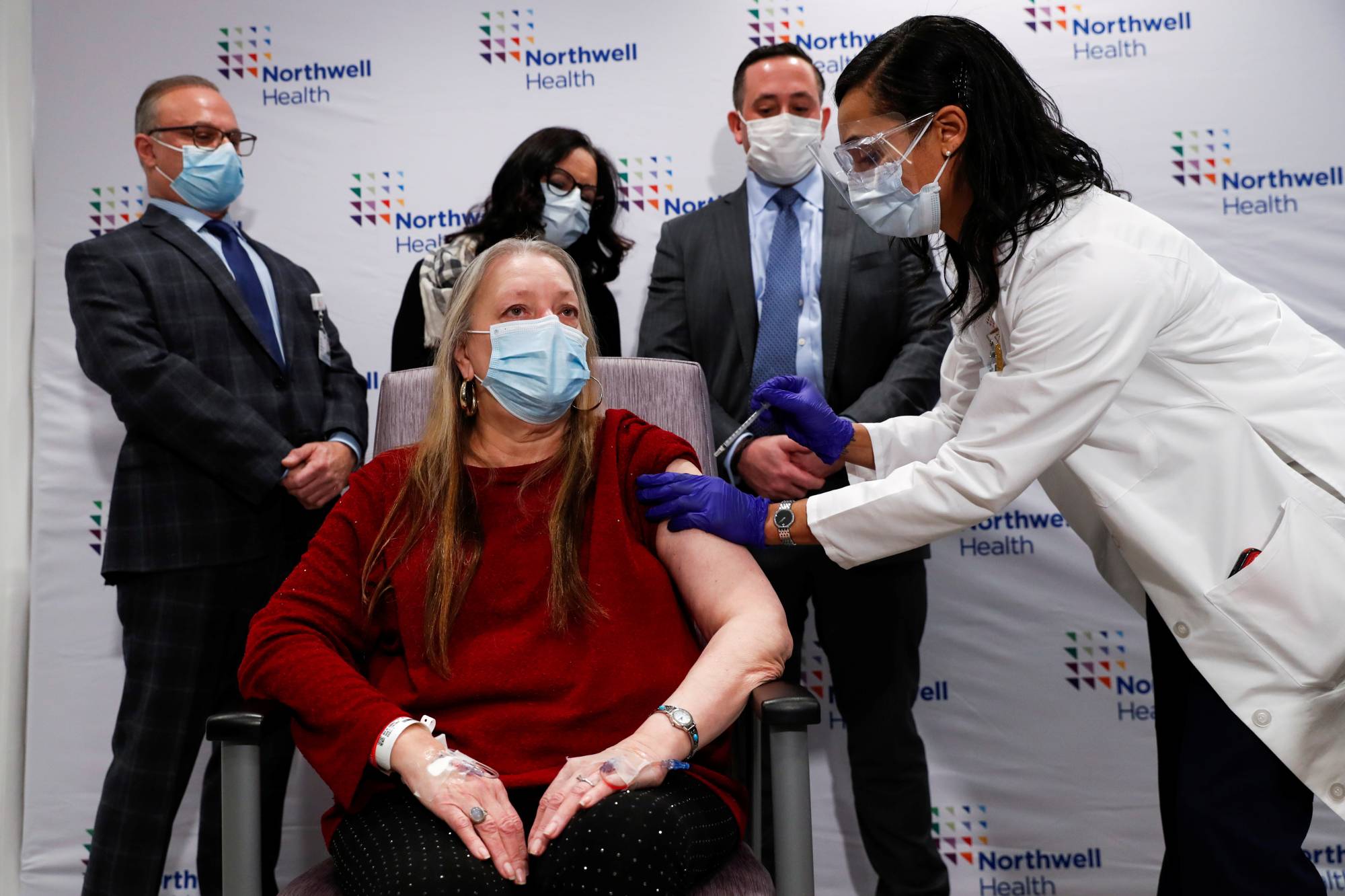 A nurse administers the Johnson & Johnson COVID-19 vaccine at Northwell Health's South Shore University Hospital in Bay Shore, New York, on Wednesday. | Reuters 