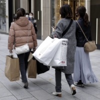 Japanese retail sales could rise this month, even if the state of emergency is extended, economists say. | BLOOMBERG