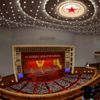 Chinese leaders and delegates attend the opening session of the National People\'s Congress at the Great Hall of the People in Beijing on Friday. | REUTERS