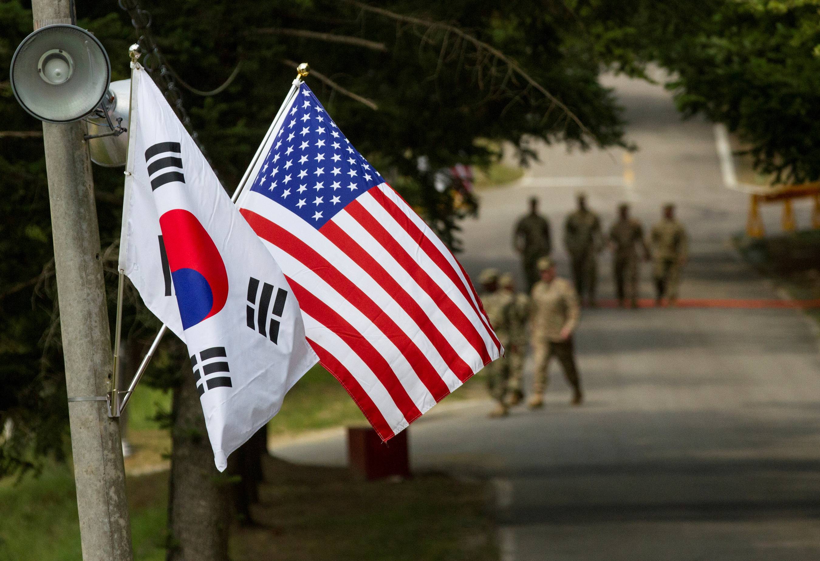 South Korea is seeking to iron out remaining differences and sign a deal with Washington on sharing costs for stationing 28,500 American troops in the country, its chief envoy has said. | REUTERS