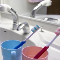 Members of the same household are being a lot more careful about mixing oral hygiene tools amid the COVID-19 pandemic. | GETTY IMAGES