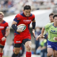 Yamaha\'s Ayumu Goromaru scores a try against NEC during his first Top League game of the season on Saturday at Chichibunomiya Rugby Ground.  | KYODO