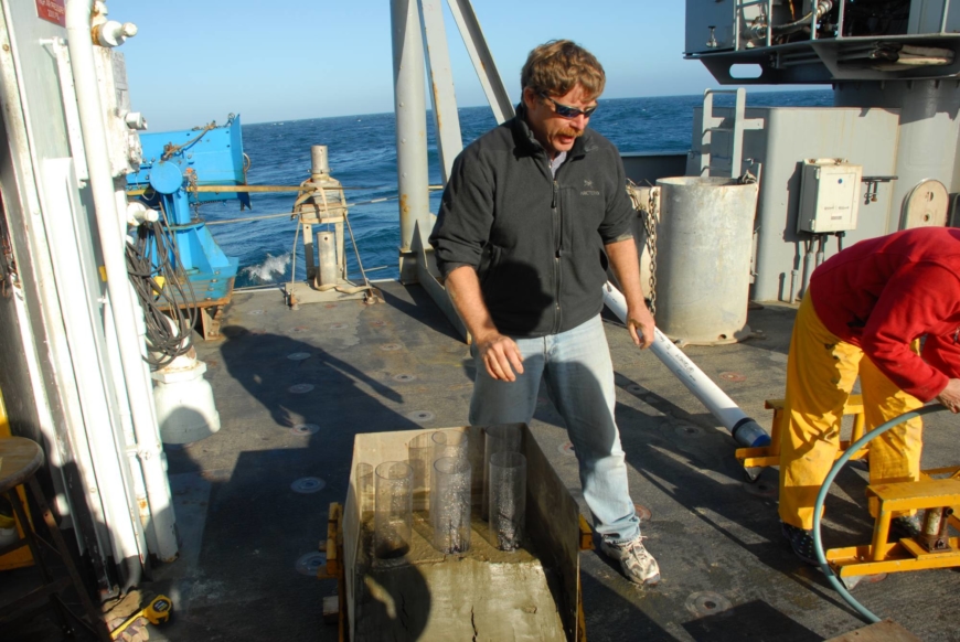 Marine geologist Chris Goldfinger conducts research on a vessel off the coast of Oregon. | COURTESY OF CHRIS GOLDFINGER 