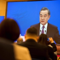 China\'s top government diplomat, Wang Yi, said China is preparing to set up regional vaccination sites for domestically produced vaccines in other countries and will provide services to compatriots who are overseas. | AFP-JIJI
