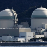 The government\'s panel on energy policy says Japan needs to restart many of its nuclear power plants to become carbon neutral by 2050. | BLOOMBERG