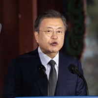 South Korean President Moon Jae-in speaks to the public in Seoul on March 1.  | POOL / VIA AFP-JIJI