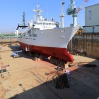 A marine research ship is repaired at shipbuilder Yamanishi Corp.\'s dock in Ishinomaki, Miyagi Prefecture, in February. | KAHOKU SHIMPO
