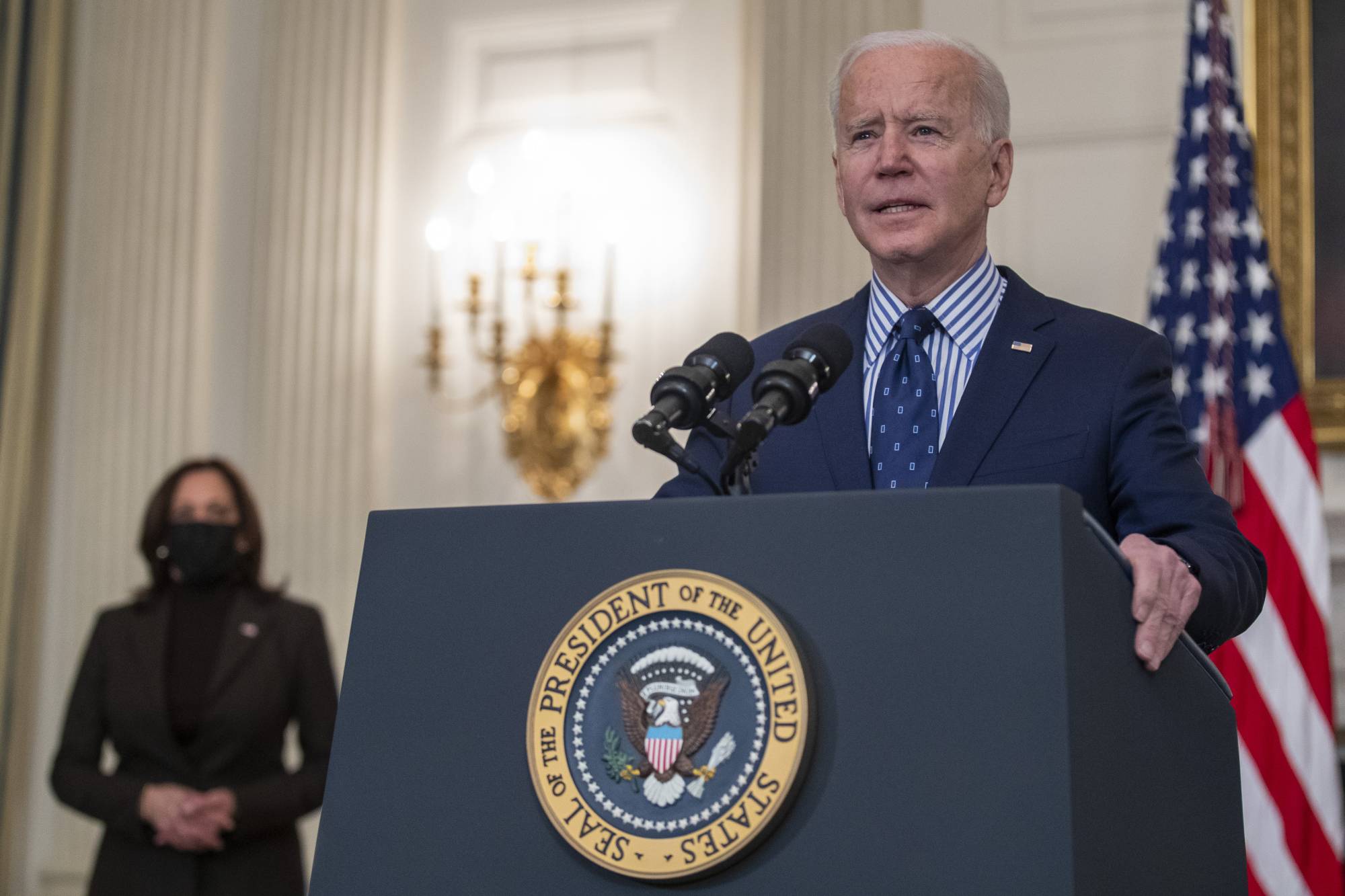 U.S. President Joe Biden delivers remarks in the State Dining Room of the White House in Washington on Saturday. | EPA / VIA Bloomberg