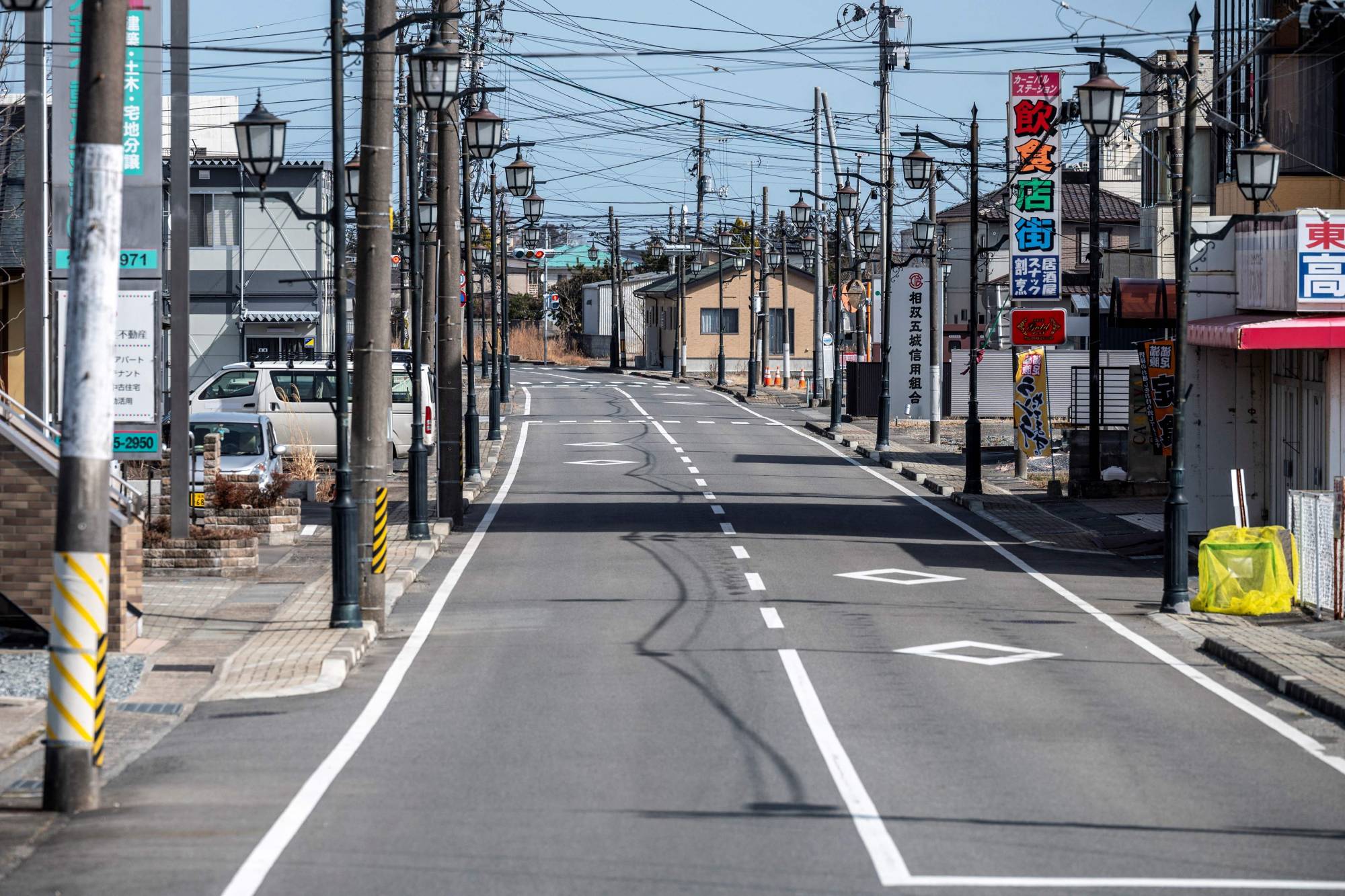 The town of Namie, Fukushima Prefecture was placed in the exclusion zone around the Fukushima No. 1 plant after the March 11, 2011, nuclear disaster. The town, with its main street seen here, has since partially reopened.  | AFP-JIJI 