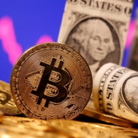 Proponents of bitcoin see it as a hedge against inflation at a time of unprecedented government stimulus, a falling dollar and record-low interest rates that make attractive high-yielding assets hard to find. | REUTERS 