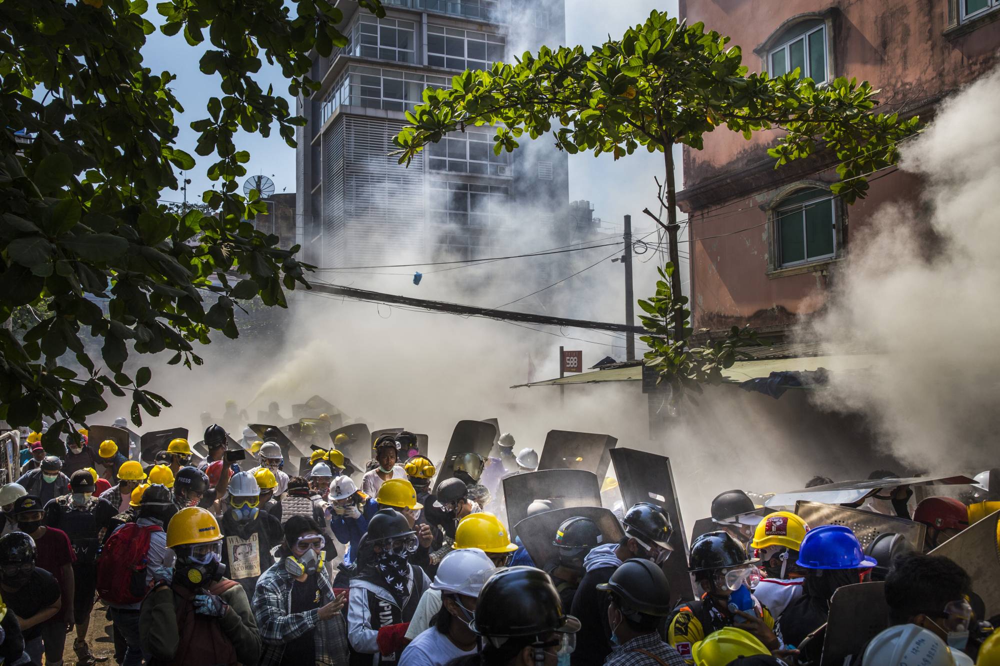 Police use tear gas, sound grenades and rubber bullets to crack down on the demonstrations in Yangon, Myanmar, on Monday.  | THE NEW YORK TIMES