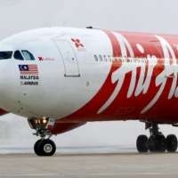 Crunched by border restrictions in Southeast Asia, low-cost airline AirAsia Group Bhd. is front loading its revenue recovery by selling 599-ringgit ($146) travel passes that allow unlimited flights in Malaysia and the ASEAN region for a year. | REUTERS