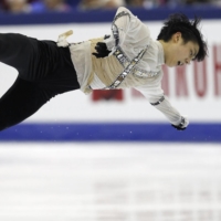 Yuzuru Hanyu performs during the men\'s free skate at the ISU World Figure Skating Championships in Nice, France, on March 31, 2012. | REUTERS