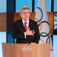 IOC President Thomas Bach speaks after being re-elected during the 137th IOC session on Lausanne, Switzerland, on Wednesday. | AFP PHOTO / IOC / GREG MARTIN