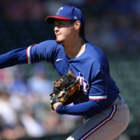 Rangers starter Kohei Arihara pitches against the Cubs during the first inning of a spring training game in Mesa, Arizona, on Monday. | USA TODAY / VIA REUTERS