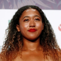 Naomi Osaka has been recognized by Glamour U.K. for her efforts to highlight racial injustice. | REUTERS