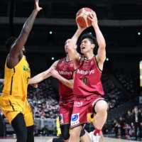 Brave Thunders guard Yuma Fujii goes up for a shot against the Brex during the All-Japan Championship final in Saitama on Saturday. | COURTESY OF THE JAPAN BASKETBALL ASSOCIATION 