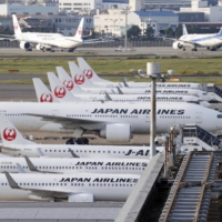 Japan Airlines Co. plans to let its flight attendants age 50 or older choose fewer working hours with salary cuts. | KYODO
