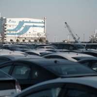 Vehicles parked at a port in the Keihin industrial area in Kawasaki in February. Japan’s exports fell 4.5% from a year earlier in February, marking the first decline in three months, as U.S. demand for items such as cars remained sluggish.  | BLOOMBERG