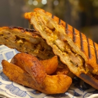 Top-notch takeout: Grab one of chef Yusuke Namai’s tongue-tingling Cubano sandwiches — reworked and better than ever — to pair with your coffee.  | COURTESY OF BGM
