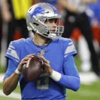Lions quarterback Matthew Stafford looks to pass against the Packers during the first quarter in Detroit on Dec. 13, 2020. | USA TODAY / VIA REUTERS