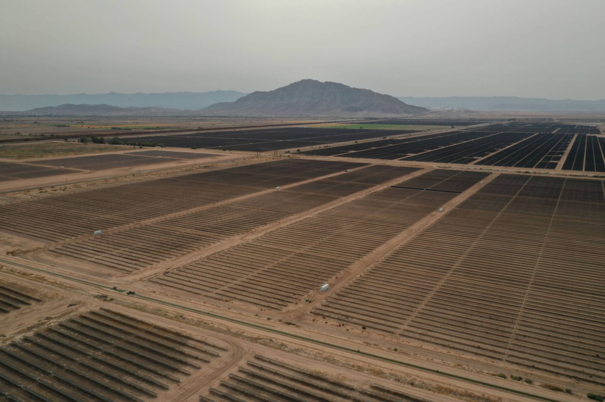 Some experts predict that the end of an era defined by uneven access to fossil fuel deposits will produce a security dividend, similar to the one that followed the end of the Cold War. | Bloomberg