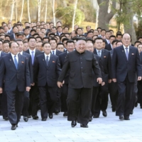 North Korea\'s leader Kim Jong Un walks with participants at an event in Pyongyang in a photo released earlier this month.  | KCNA / VIA REUTERS