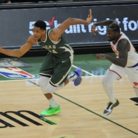 Bucks forward Giannis Antetokounmpo (left) signed a five-year contract extension worth about $228 million before the start of the season. | USA TODAY / VIA REUTERS