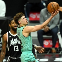 Hornets guard LaMelo Ball goes up for a layup against the Clippers in Los Angeles on Saturday. | USA TODAY / VIA REUTERS