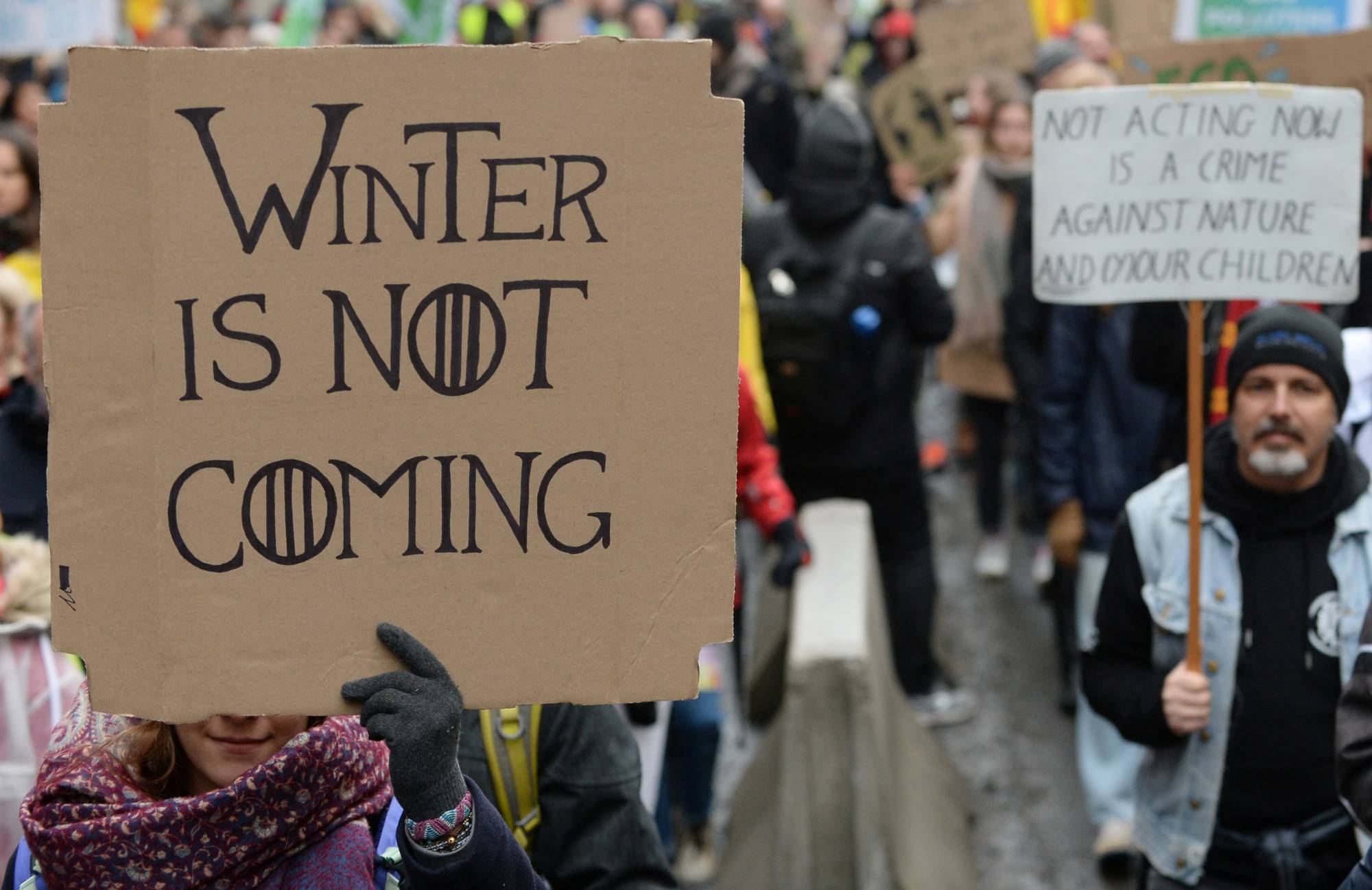 Demonstrators take part in the Europe Climate Strike rally in Brussels on March 6. | REUTERS