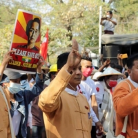 Myint Htwe, a regional lawmaker, addresses a crowd in Monywa, in the Sagaing region of Myanmar, after the Feb. 1 military coup. | REUTERS 