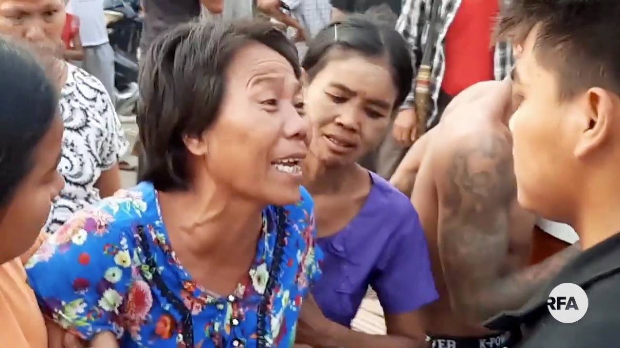 People mourn during the funeral for Tun Tun Aung, a 15-year-old, who was killed in his hut when security forces opened fire, in Mandalay, Myanmar, on Monday. | RADIO FREE ASIA / via REUTERS 