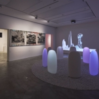 Installation view of Mariko Mori’s “Transcircle” (foreground), Pierre Huyghe’s “One Million Kingdoms” (background) and “Darkside of the Moon No.1” by Yuki Onodera (left) at Gyre Gallery  | COURTESY OF GYRE GALLERY 
