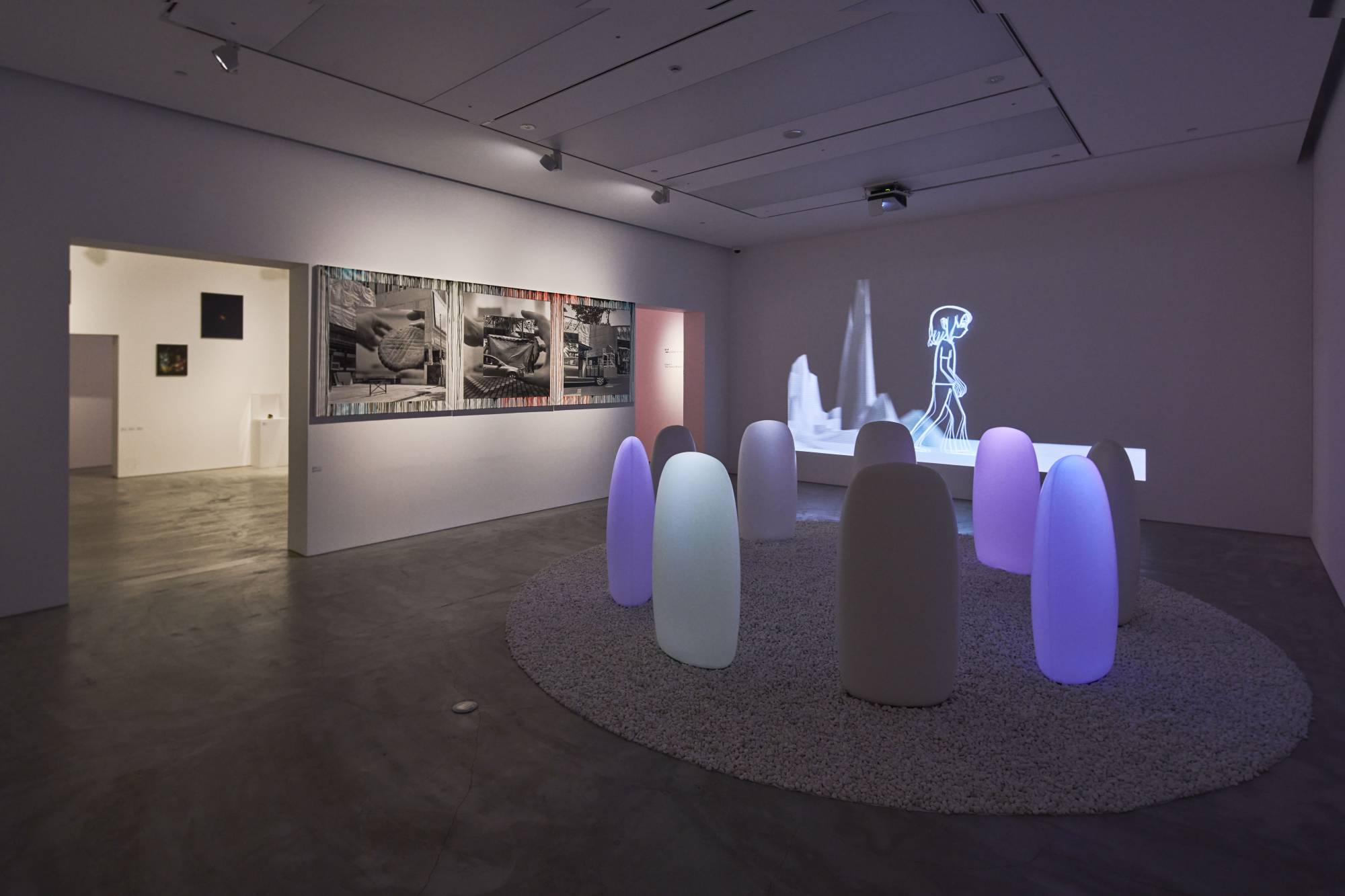 Installation view of Mariko Mori’s 'Transcircle' (foreground), Pierre Huyghe’s 'One Million Kingdoms' (background) and 'Darkside of the Moon No.1' by Yuki Onodera (left) at Gyre Gallery  | COURTESY OF GYRE GALLERY 
