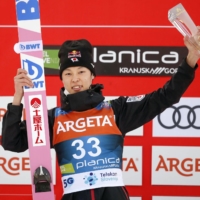 Ryoyu Kobayashi poses for a photo after winning the ski flying World Cup event in Planica, Slovenia, on Thursday. | AP / VIA KYODO